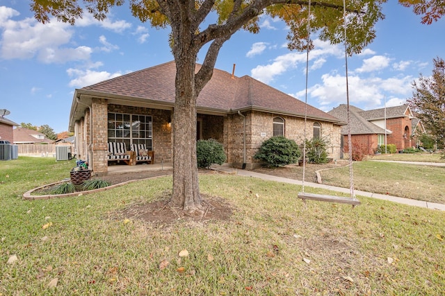 single story home featuring central AC and a front lawn