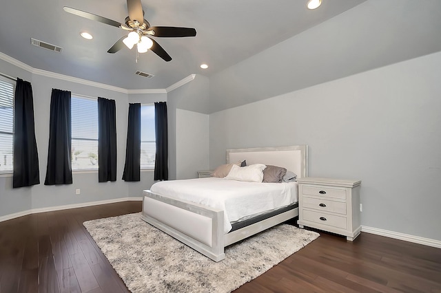 bedroom featuring vaulted ceiling, ceiling fan, crown molding, and dark hardwood / wood-style floors