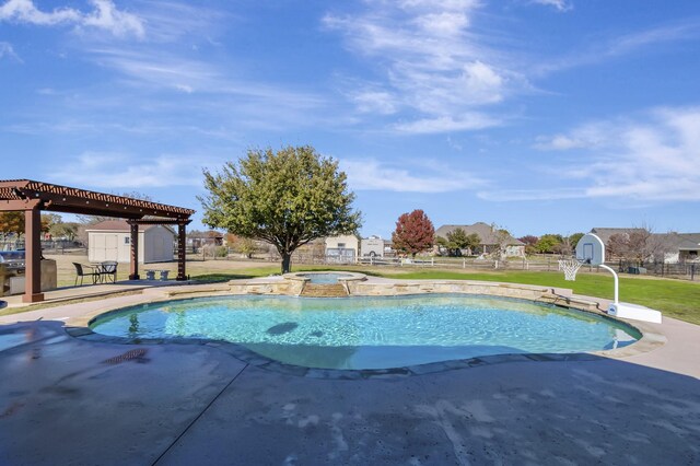 view of swimming pool featuring a lawn, a pergola, an in ground hot tub, and a storage shed