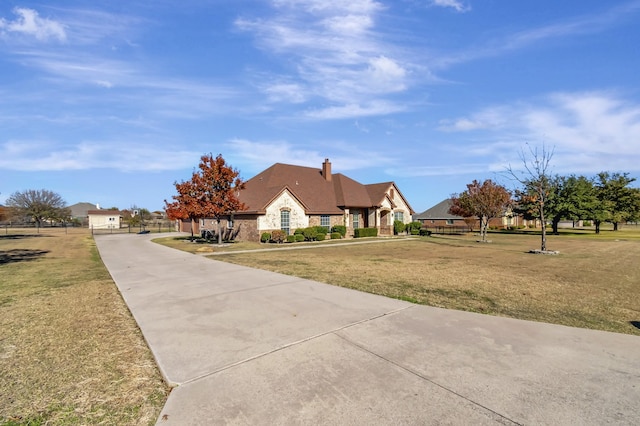 view of front facade with a front lawn