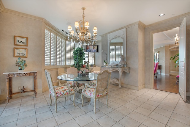 tiled dining room with ornamental molding and a chandelier