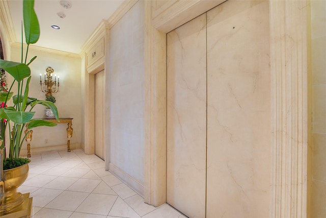 hallway featuring light tile patterned floors and ornamental molding