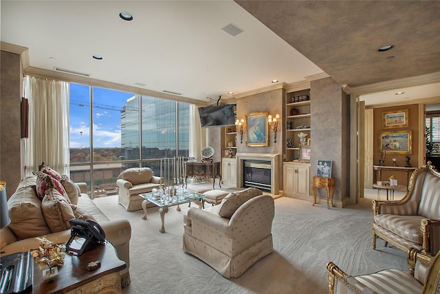 carpeted living room with ornamental molding, floor to ceiling windows, and built in shelves