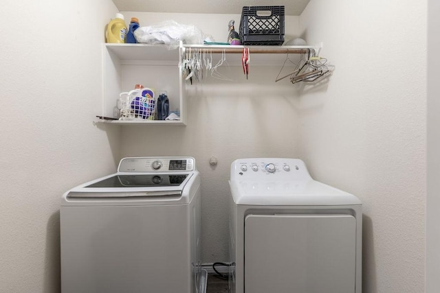 washroom featuring separate washer and dryer