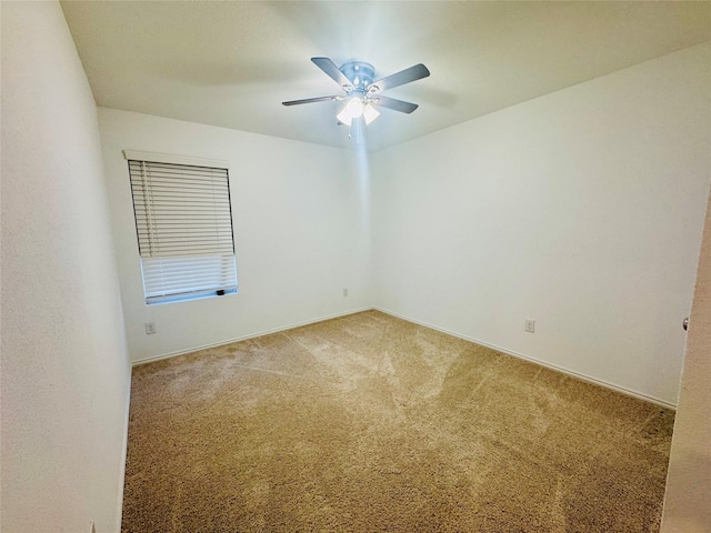 unfurnished room featuring carpet floors and ceiling fan