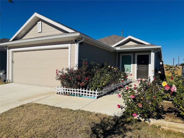 ranch-style home with a garage