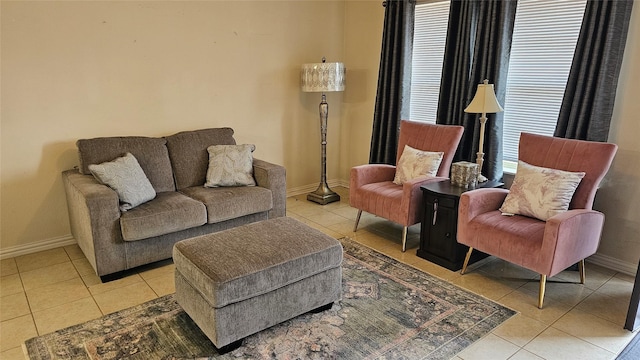 living area featuring light tile patterned flooring and a wealth of natural light