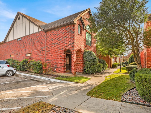 view of home's exterior featuring a lawn