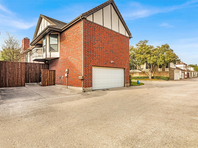 view of property exterior with a garage