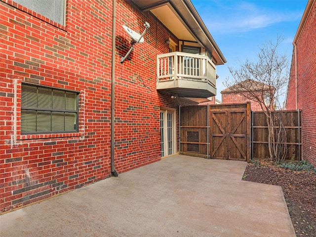 view of patio / terrace with a balcony