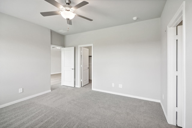 unfurnished bedroom with carpet and ceiling fan