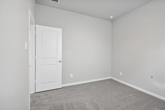 unfurnished room featuring carpet floors