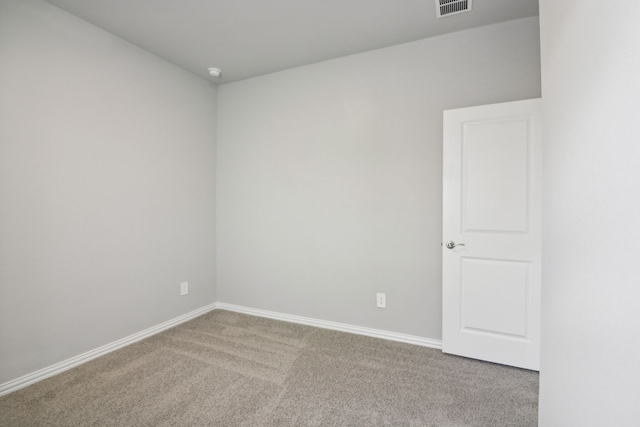 spare room with carpet floors