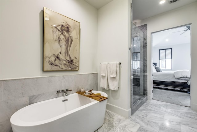 bathroom featuring ensuite bathroom, visible vents, marble finish floor, a soaking tub, and a stall shower