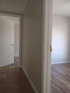 hall featuring dark wood-type flooring