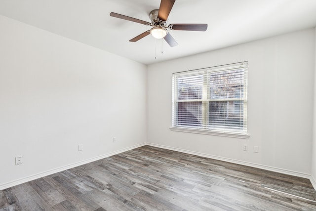 unfurnished room featuring hardwood / wood-style flooring and ceiling fan