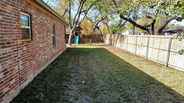 view of yard featuring a playground