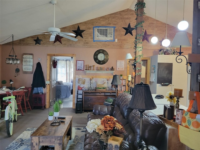 carpeted living room with ceiling fan and high vaulted ceiling