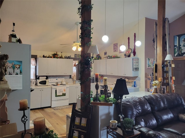 kitchen with white range with electric cooktop, white cabinetry, hanging light fixtures, backsplash, and light hardwood / wood-style floors