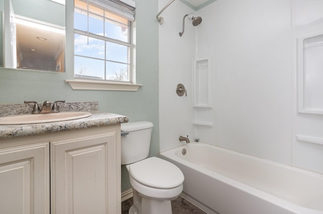 full bathroom featuring  shower combination, vanity, and toilet