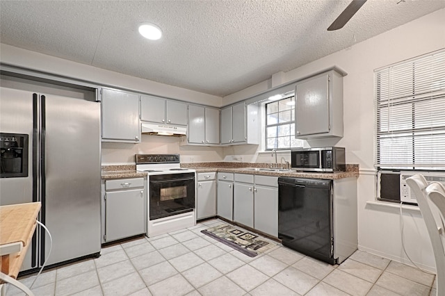 kitchen featuring sink, light tile patterned floors, gray cabinets, cooling unit, and stainless steel appliances