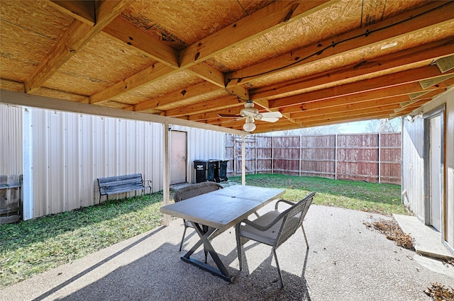 view of patio featuring ceiling fan