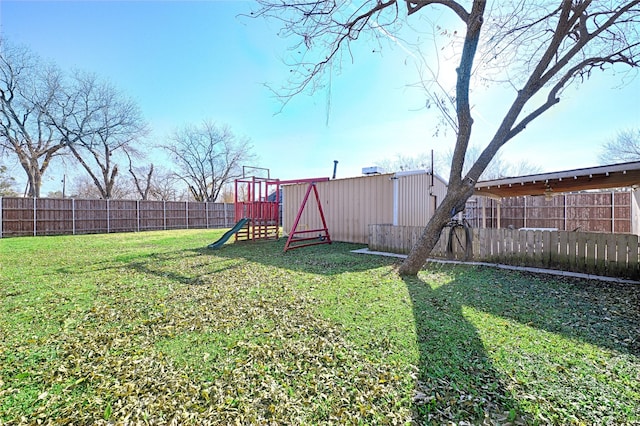 view of yard with a playground