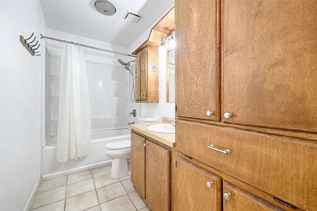 full bathroom with vanity, tile patterned flooring, toilet, a textured ceiling, and shower / tub combo