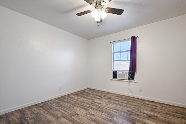 unfurnished room featuring ceiling fan, dark hardwood / wood-style flooring, and cooling unit