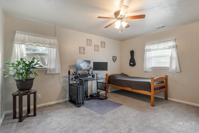 bedroom featuring ceiling fan and carpet floors