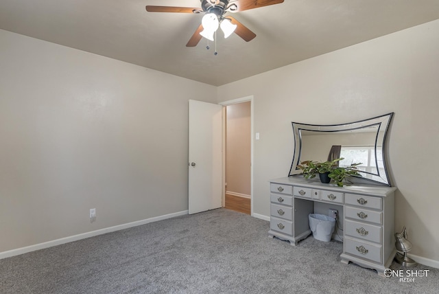 unfurnished office with light carpet and ceiling fan