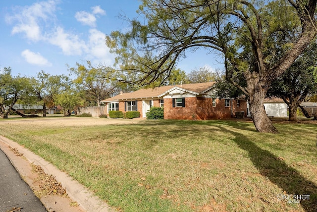 ranch-style house with a front yard