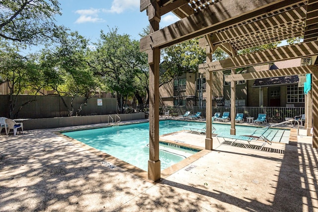 view of pool with a patio area, a community hot tub, and a pergola