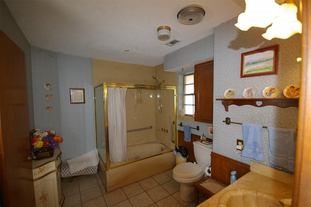 full bathroom featuring tile patterned flooring, vanity, shower / bath combo, and toilet