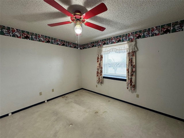 unfurnished room with a textured ceiling and ceiling fan