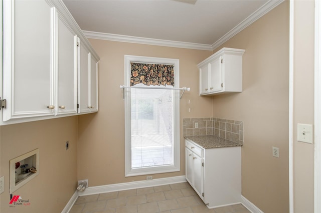 laundry area with cabinets, crown molding, washer hookup, light tile patterned floors, and hookup for an electric dryer