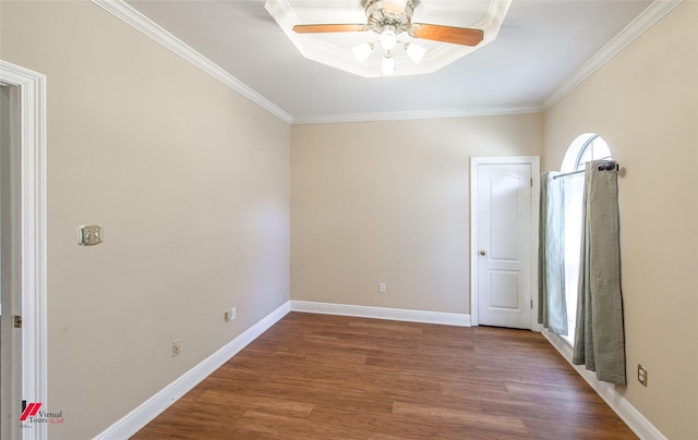 unfurnished bedroom featuring wood-type flooring, ceiling fan, and crown molding