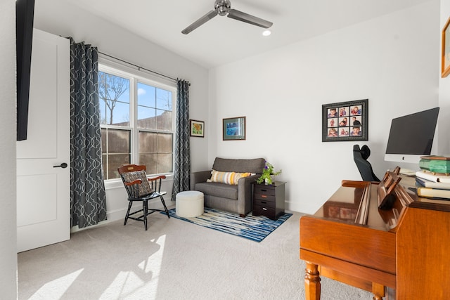 office with carpet flooring and ceiling fan