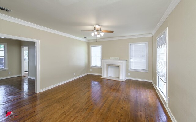 unfurnished living room with dark hardwood / wood-style flooring, ceiling fan, and crown molding