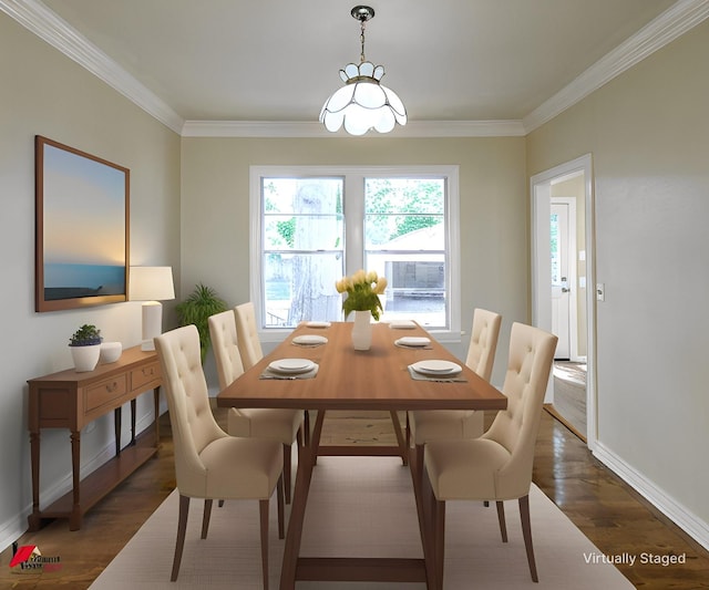 dining space featuring crown molding, baseboards, and wood finished floors