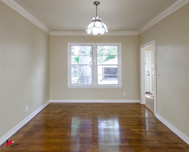 unfurnished dining area featuring dark wood-type flooring and ornamental molding