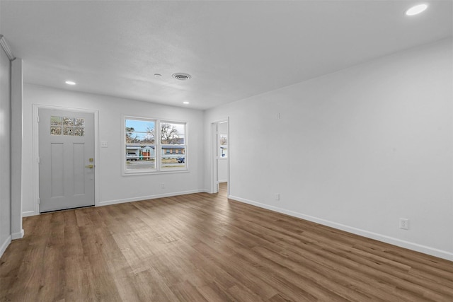 interior space with hardwood / wood-style floors