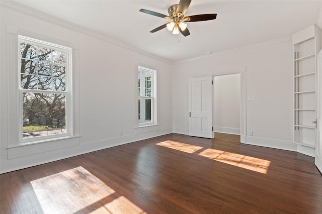 interior space with ceiling fan, crown molding, and dark wood-type flooring