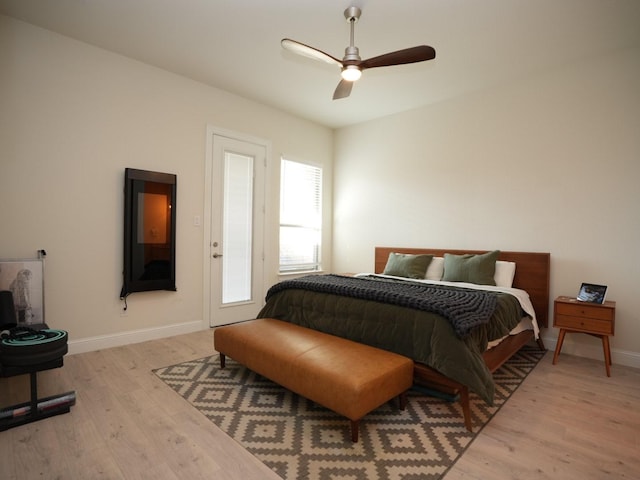 bedroom featuring ceiling fan and light hardwood / wood-style flooring