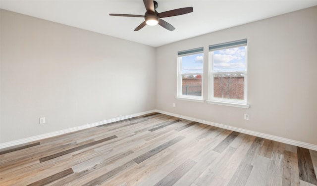 unfurnished room with light hardwood / wood-style floors and ceiling fan