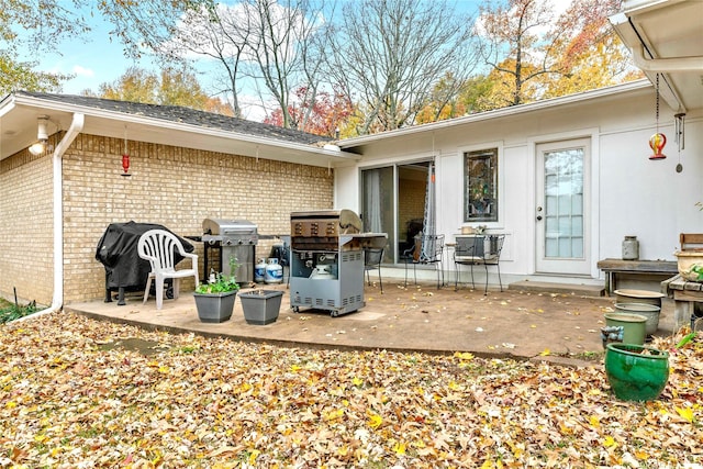 rear view of property featuring a patio