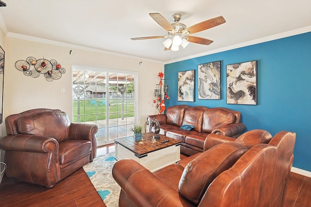 living room with ceiling fan, dark hardwood / wood-style flooring, and crown molding