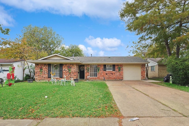 ranch-style home featuring a garage and a front yard