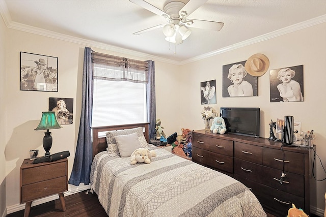 bedroom with ceiling fan, dark hardwood / wood-style flooring, and crown molding