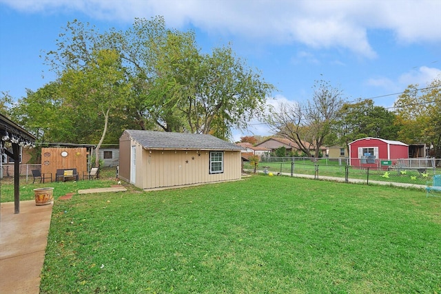 view of yard featuring a storage unit